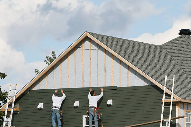 Professional Emergency Siding Repair technician working in Madison, IL